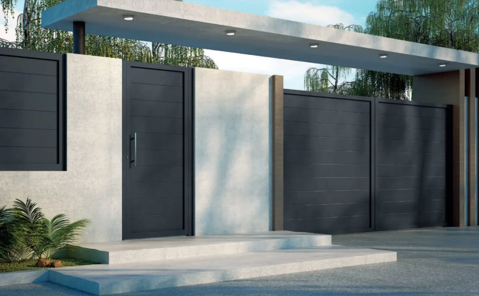 Cancela corredera de aluminio en el acceso a una vivienda contemporánea